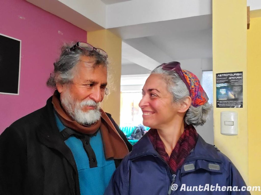a man and woman with grey hair looking at each other